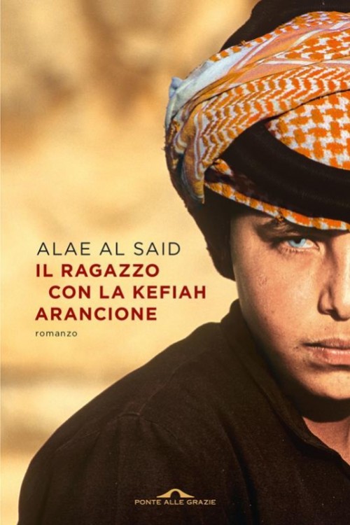 Il ragazzo con la kefiah arancione.